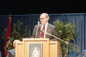 Joe Johnson speaks at a podium at the University of Tennessee